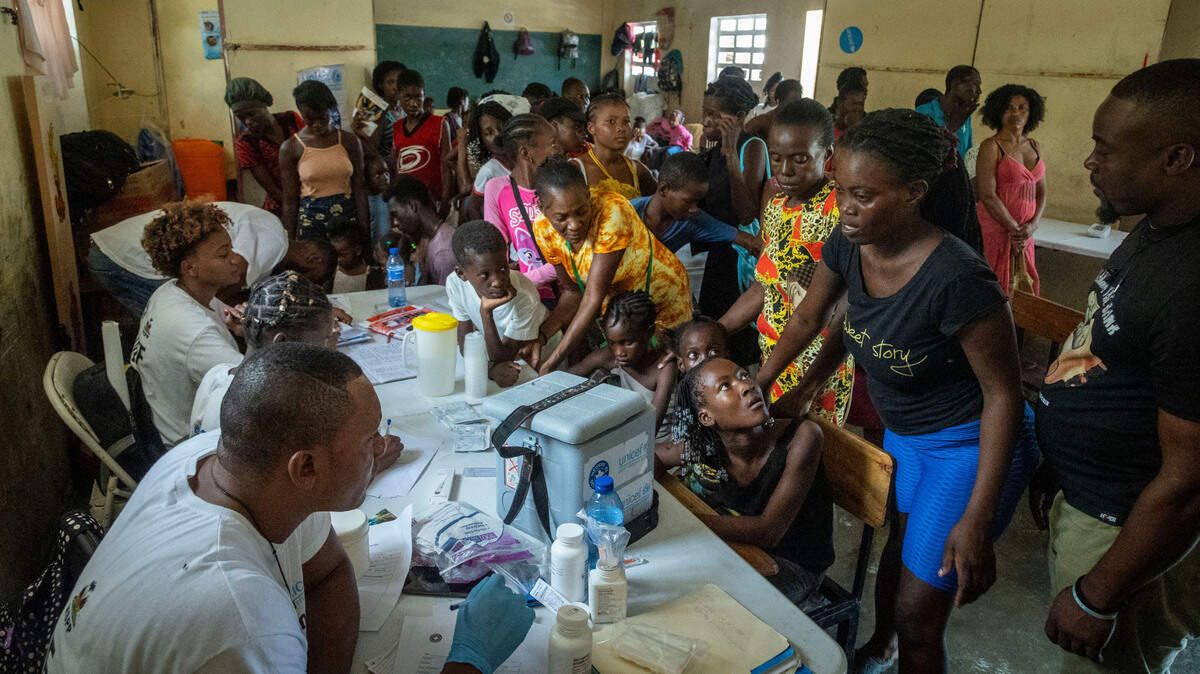 Displaced residents of Port-au-Prince line up to get medical attention at the Ecole National Joseph C. Bernard DeFreres displacement camp. More than 1.4 million Haitians have been forced to leave their homes due to gang violence and have taken refuge in several locations in Port-au-Prince.
